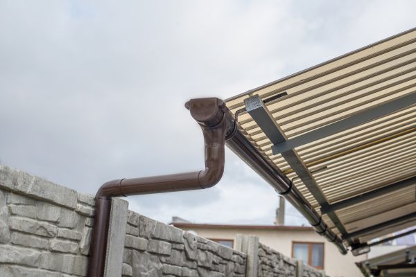 Plastic Downspout Installation in Grand Haven